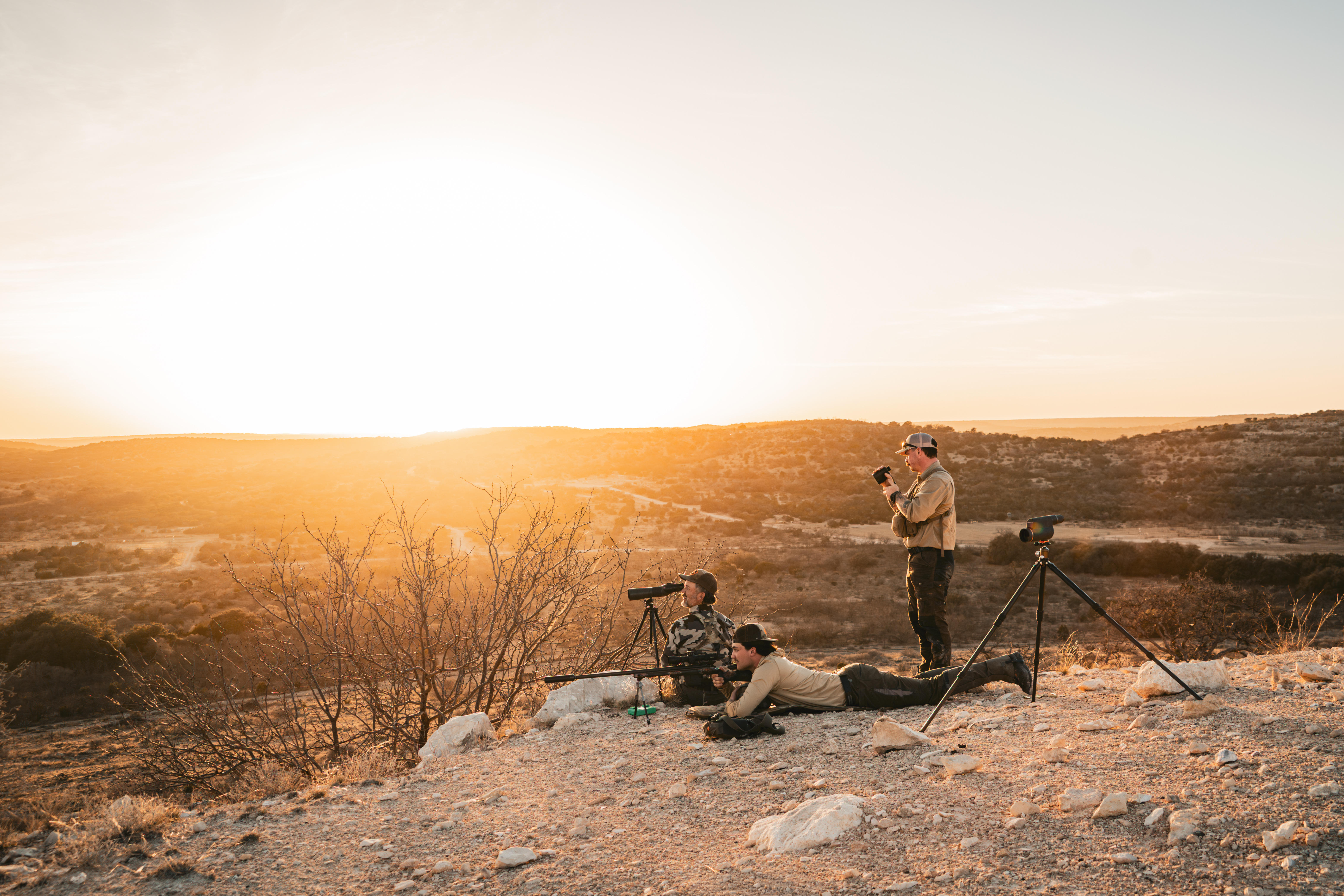 Golden hour shooters on hilltop